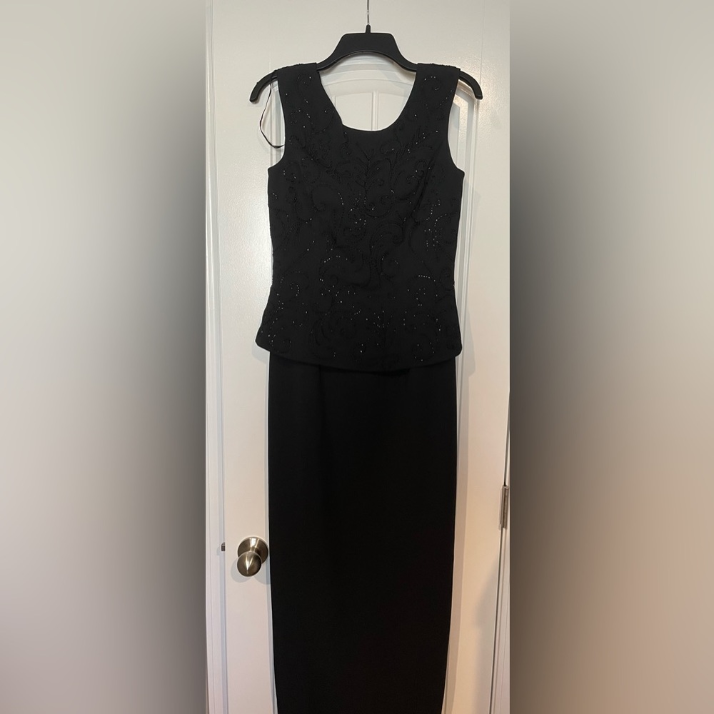 Black formal gown Size 4 worn once and dry cleaned